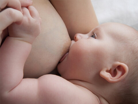 Mother breastfeeding baby